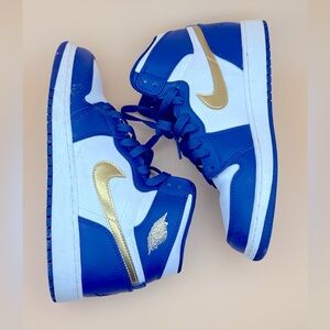 Blue and white kids Air Jordan’s